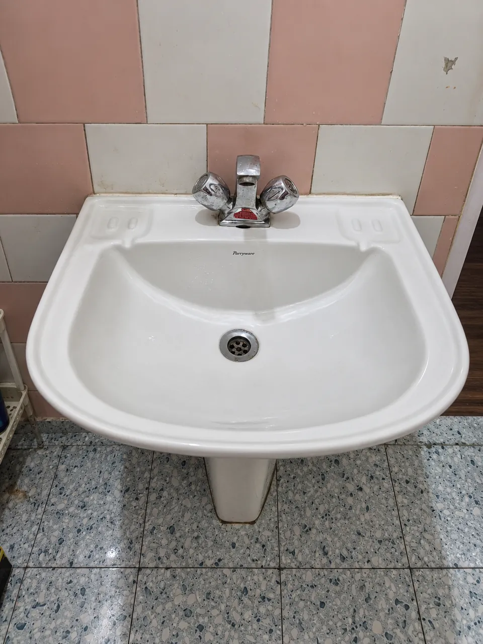 White wash basin with a mixer tap